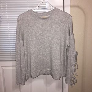 Hologram light fleece top with side ties on arms